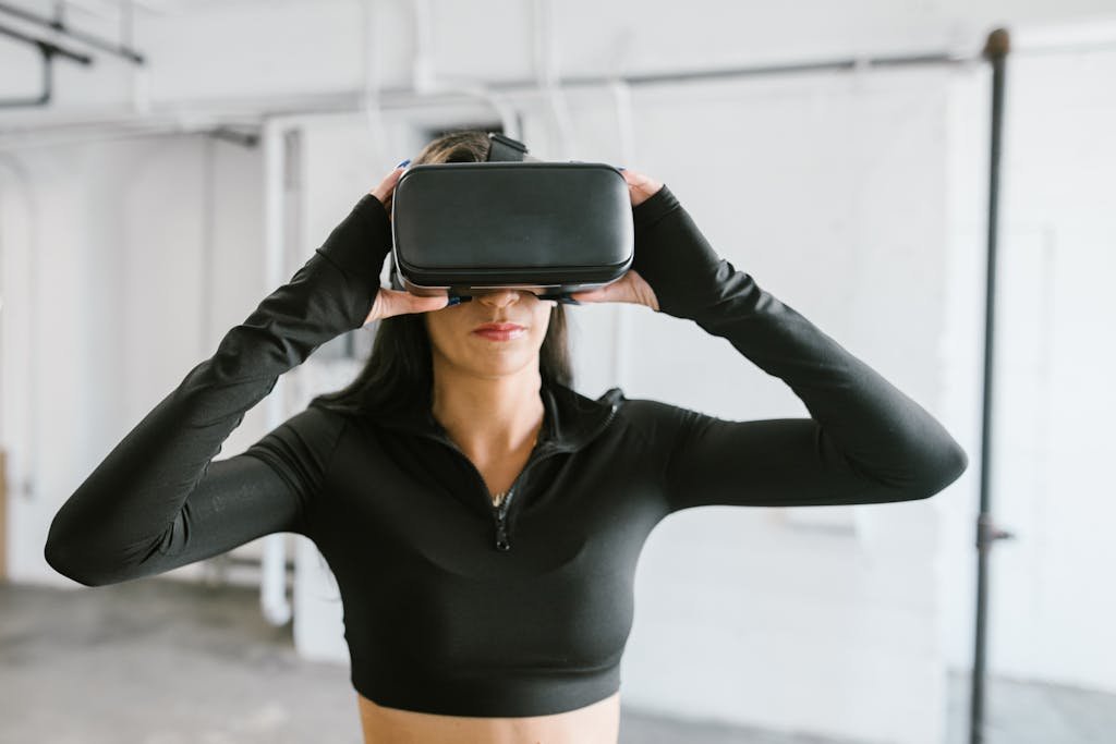 A Woman Wearing Black VR Glasses