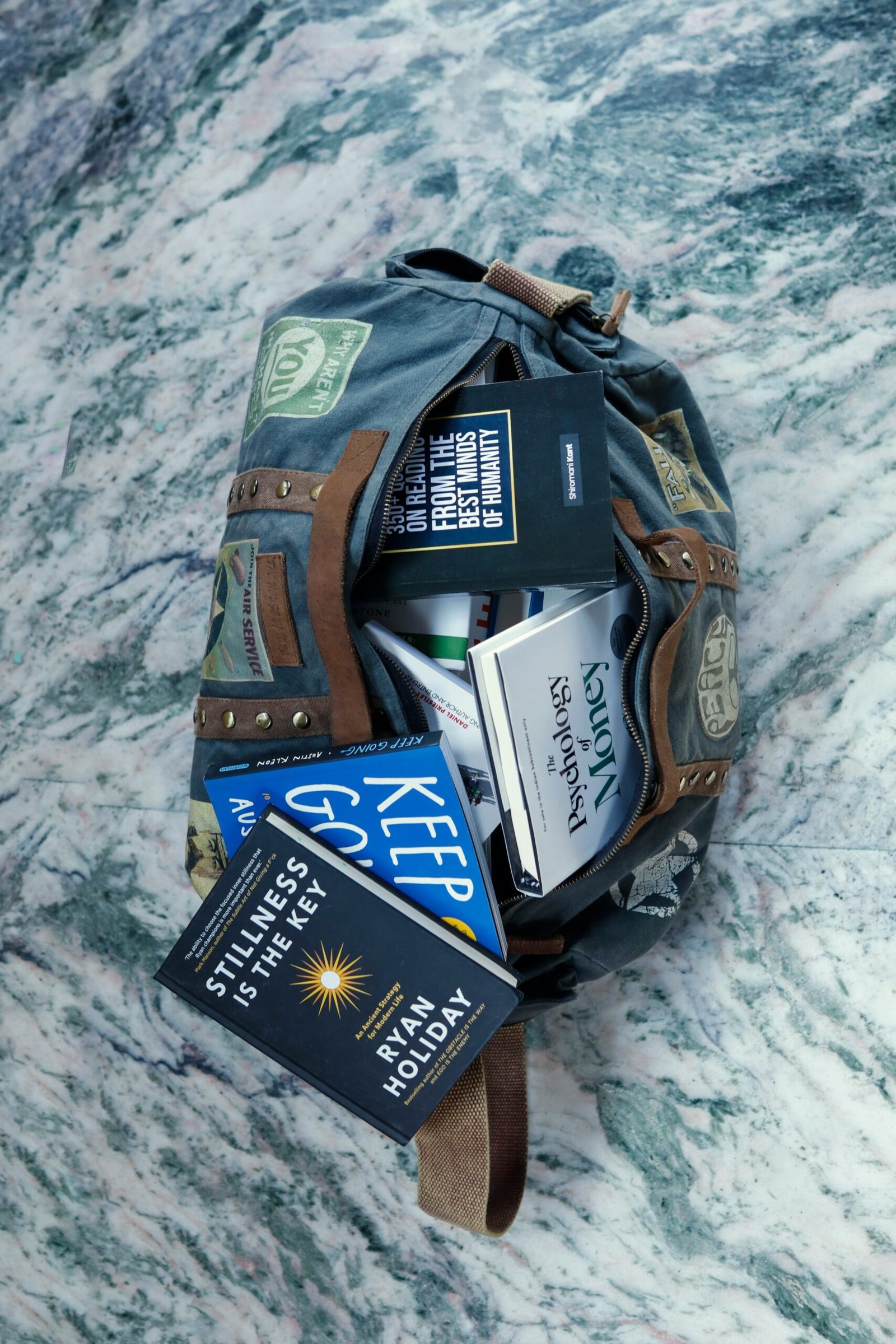 a backpack filled with books and other items