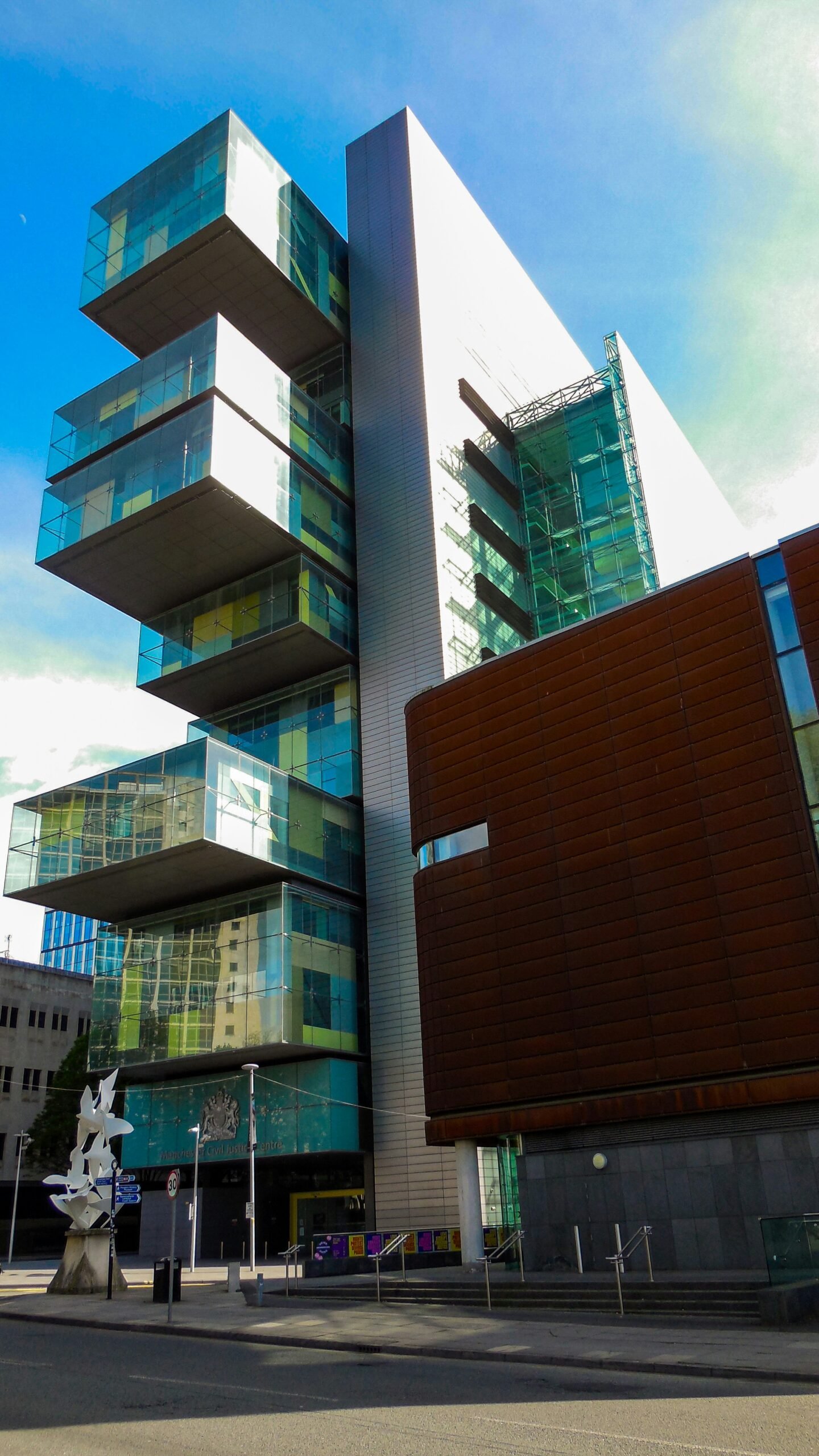 a tall building with many windows on the side of it